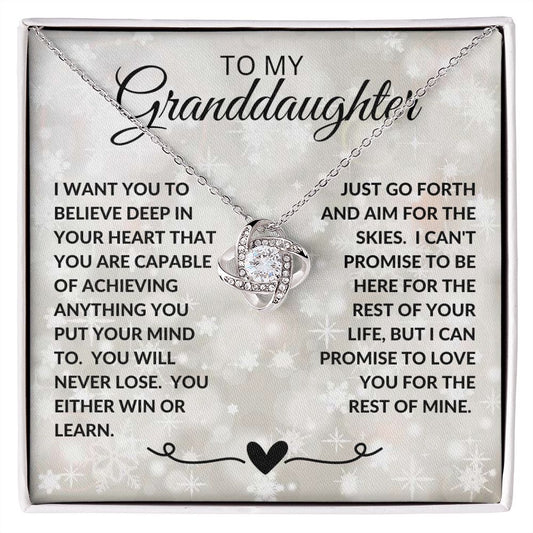 To My Granddaughter | Love Knot Necklace | White Snowflakes Background